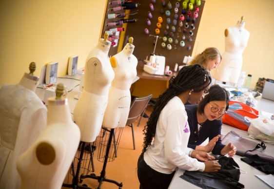 students and faculty in Albright's fashion studio