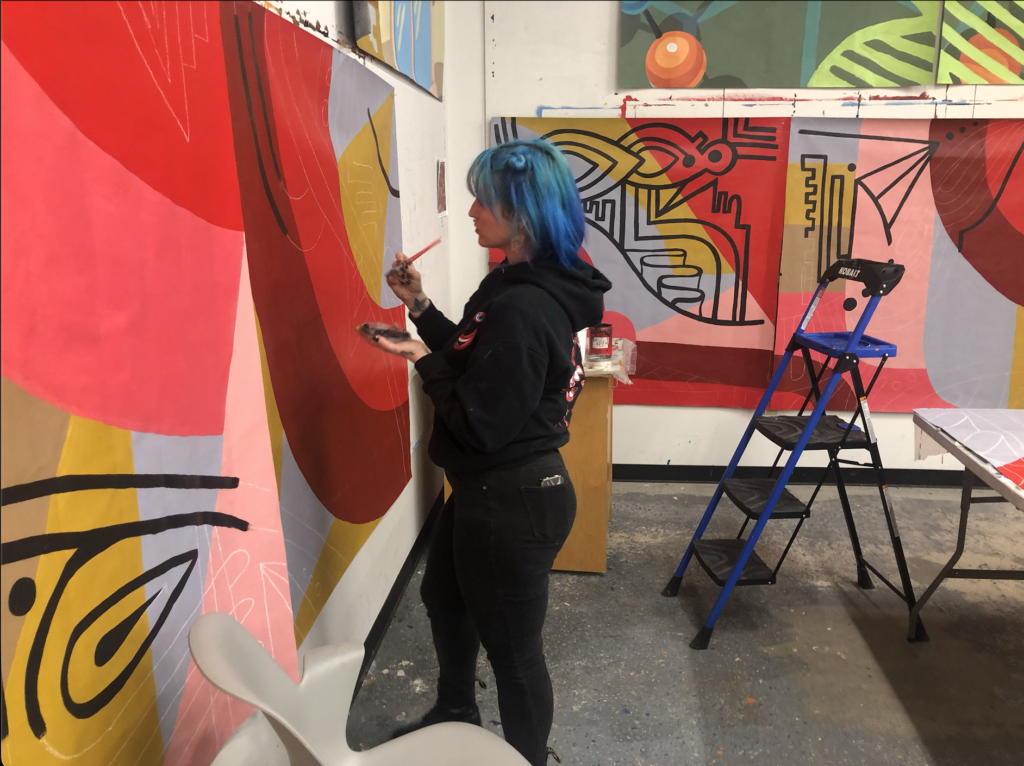 painting a mural in the Public Art Studio